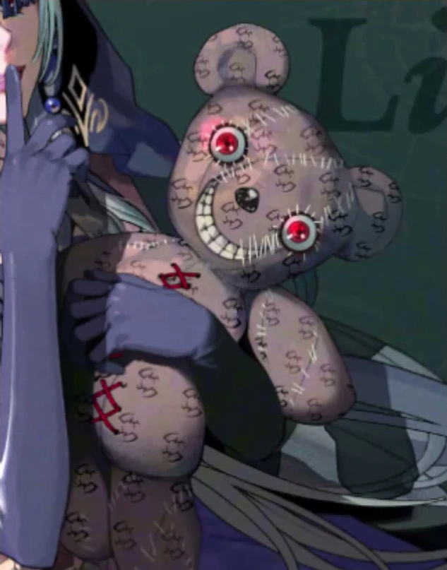 Repeated patterns cover the body of the doll held by the lady.